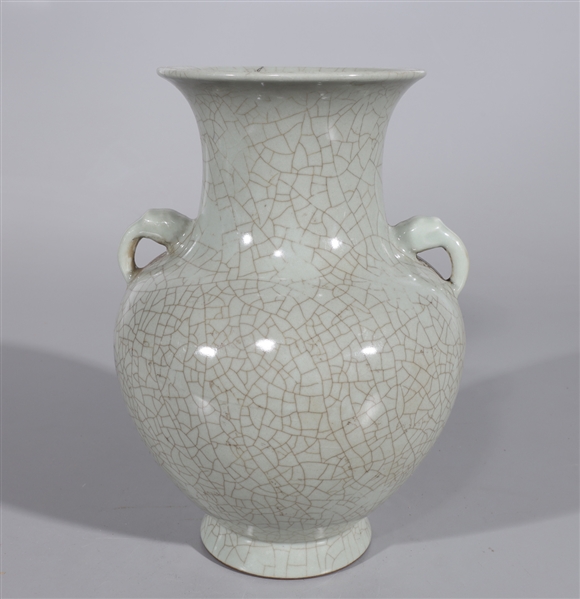 Appraisal: Chinese celadon crackle glazed vase with handles and mark to