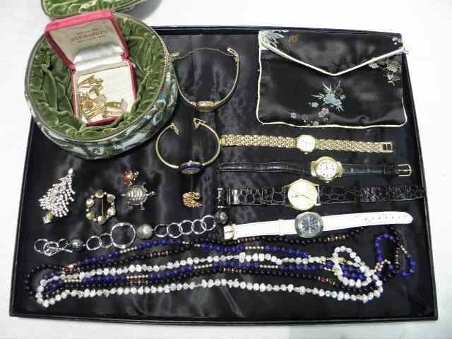 Appraisal: Lot of assorted costume jewelry Includes pins broaches necklaces bracelets