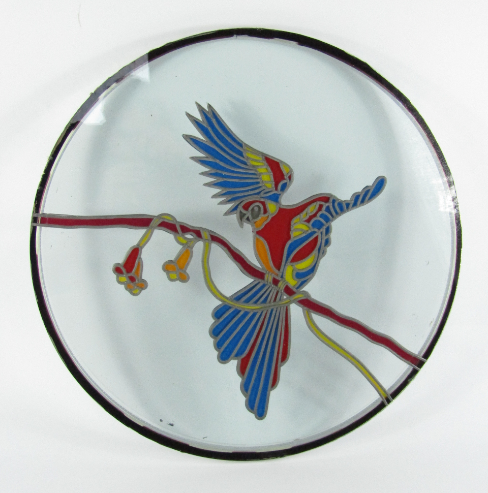 Appraisal: A circular stained glass window panel decorated with a Macaw