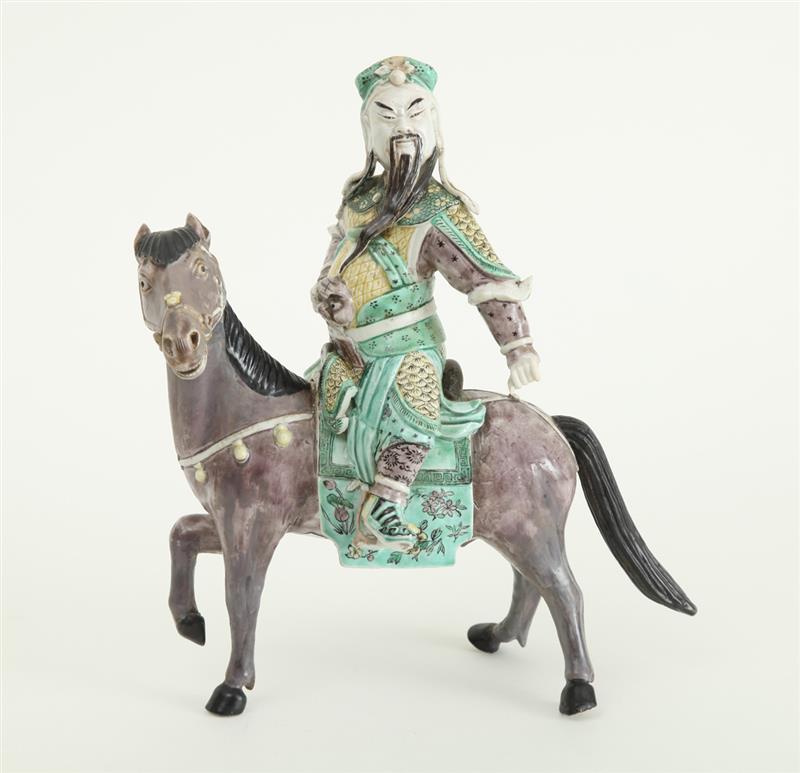 Appraisal: CHINESE GLAZED BISCUIT PORCELAIN EQUESTRIAN FIGURE Modeled as nobleman sitting