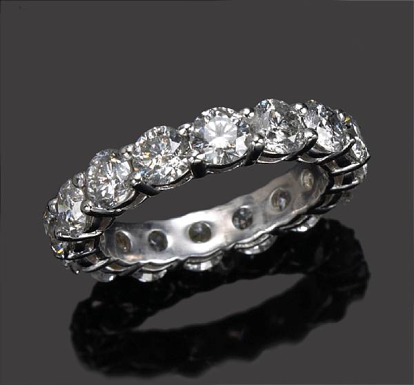 Appraisal: A diamond eternity ring estimated total diamond weight carats mounted