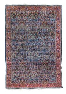 Appraisal: A Hereke Wool Rug feet inches x feet inches A