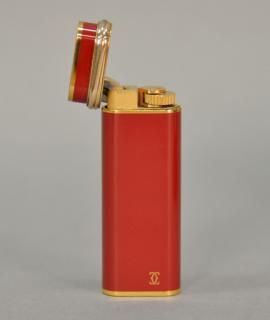 Appraisal: Cartier Chinese red enameled Trinity lighter Cartier Chinese red enameled