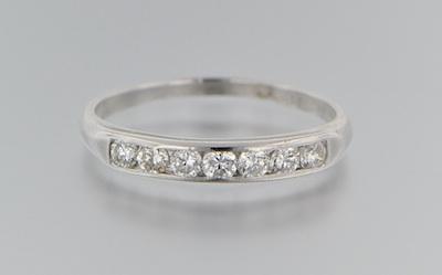 Appraisal: A Platinum and Diamond Ring Platinum ring set with seven