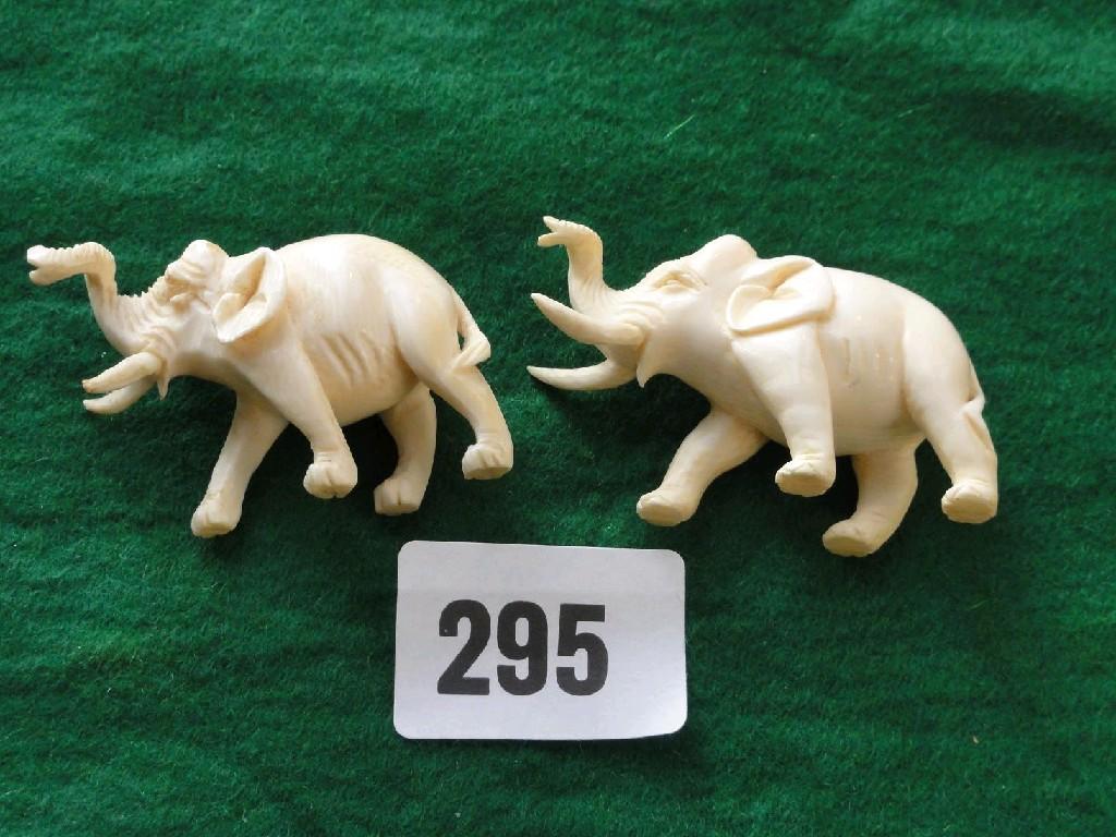 Appraisal: A pair of carved ivory elephants