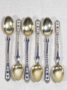 Appraisal: A set of six coffee spoons with enamel decorated stems