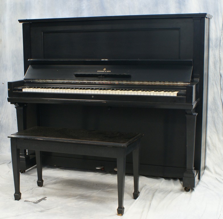 Appraisal: Black lacquer Steinway console piano with bench SN w h