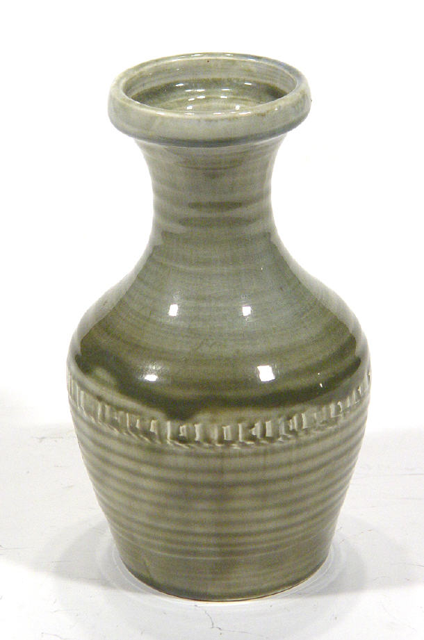 Appraisal: Moorcroft Pottery Handcraft ribbed vase decorated in a green glaze