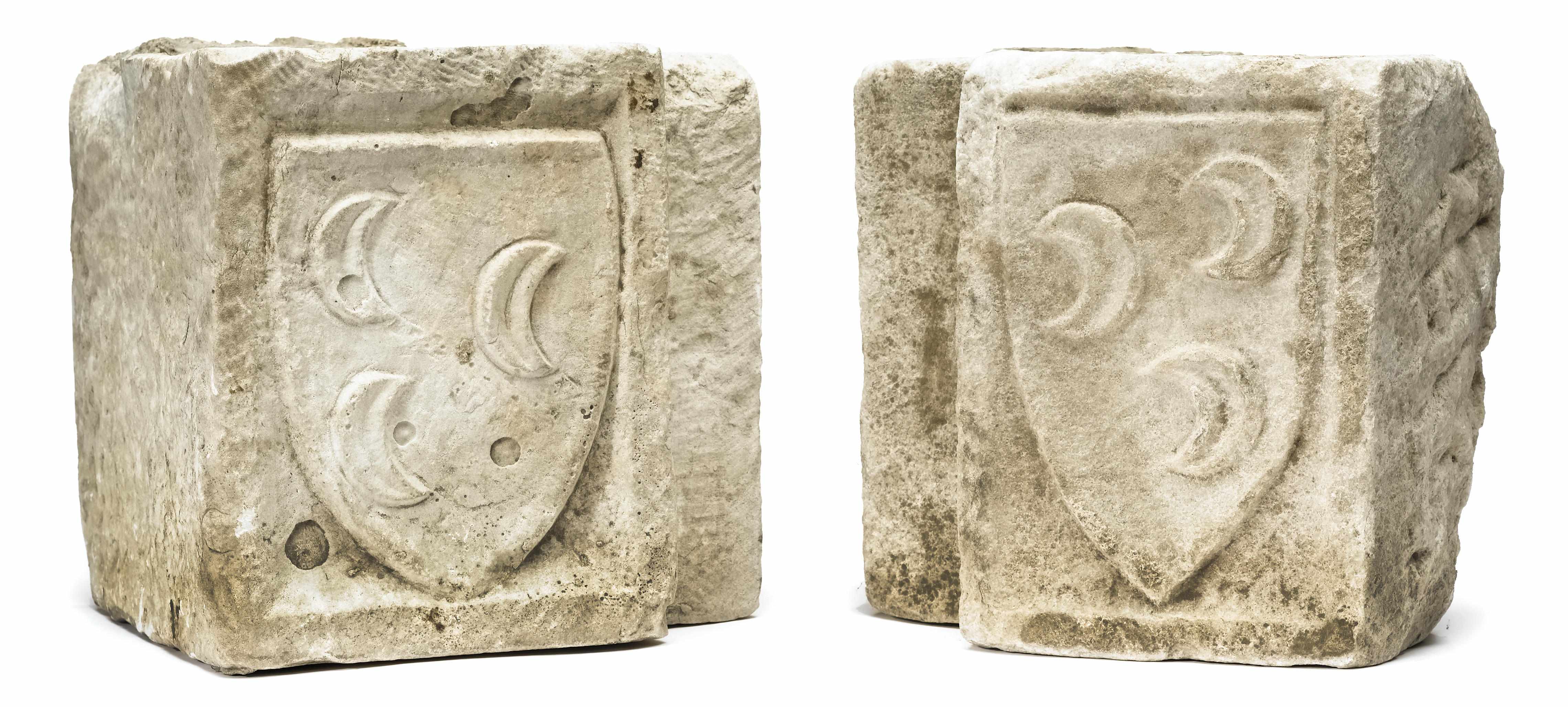 Appraisal: Two carved marble architectural fragments decorated with armorials th century