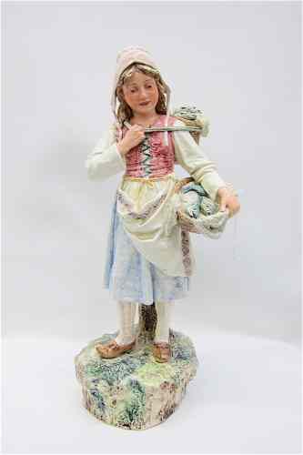 Appraisal: HAND ENAMELED PORCELAIN FIGURINE depicting a young Dutch maiden carrying