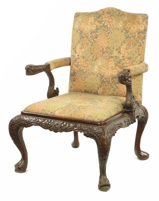 Appraisal: A library armchair in mid th century Irish style the