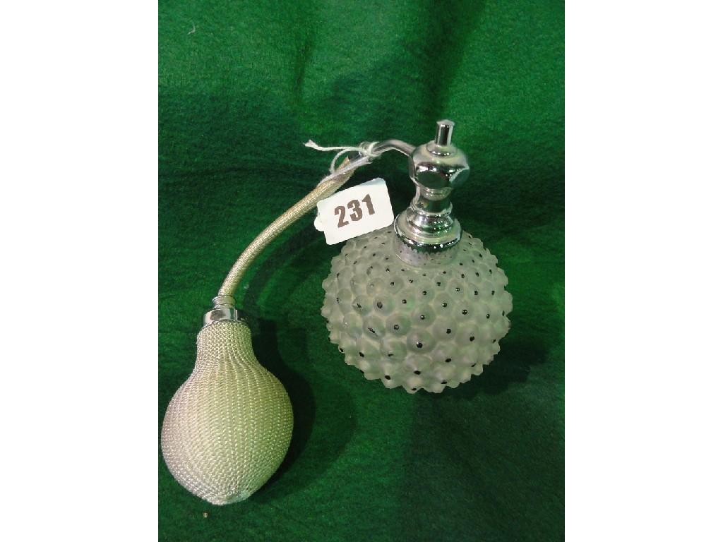 Appraisal: A glass scent bottle with frogspawn style modelling of globular