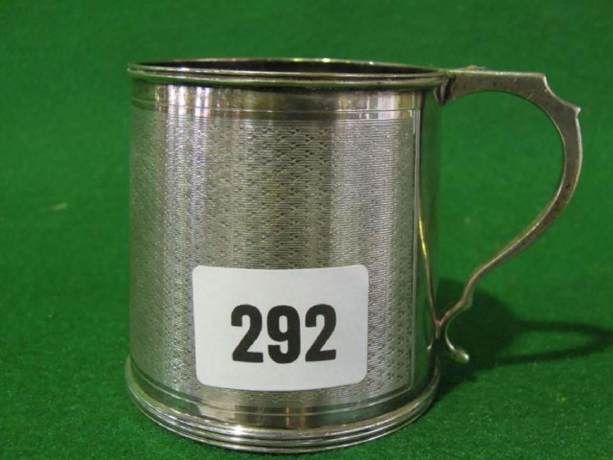 Appraisal: A Scottish silver christening mug with engine turned decoration hallmarked