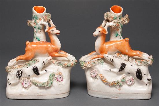 Appraisal: Pair of Staffordshire earthenware hound and stag-form spill vases mid