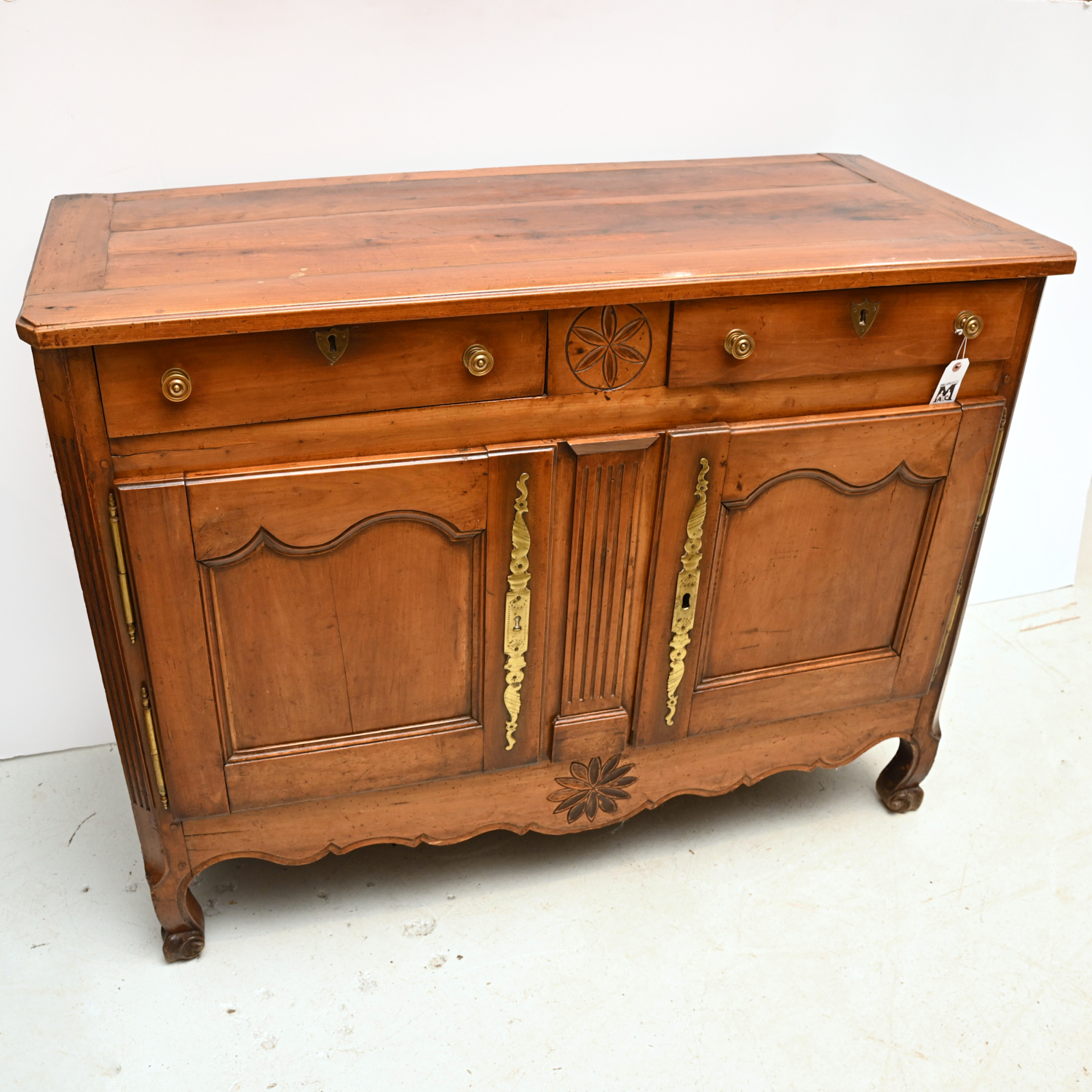 Appraisal: ANTIQUE FRENCH PROVINCIAL CARVED FRUITWOOD BUFFET th c with carved