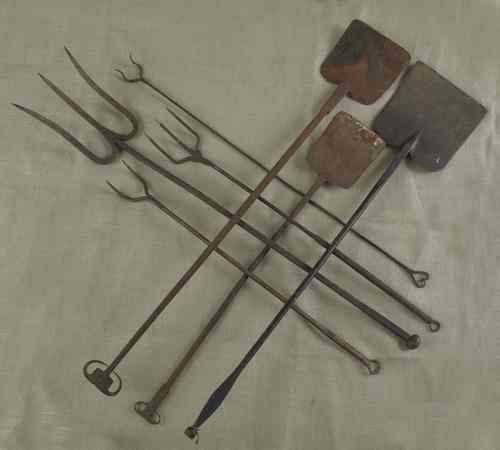 Appraisal: Group of forged iron fire tools th c longest -