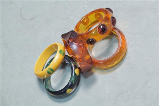 Appraisal: FIVE BAKELITE BRACELETS All bangles Two with inlaid polka-dots one