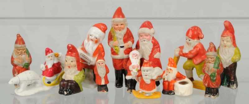 Appraisal: Lot of German China Bisque Santa Figures Condition Excellent Size