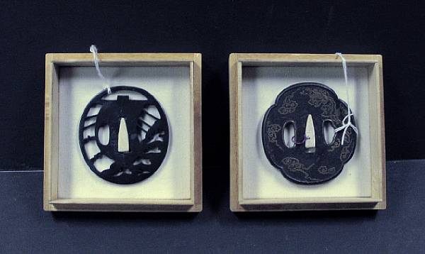 Appraisal: Two cast iron tsuba The first of oval shape and