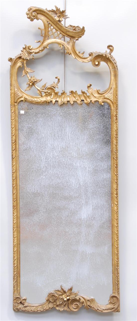 Appraisal: GILT MIRROR WITH CARVED TOP