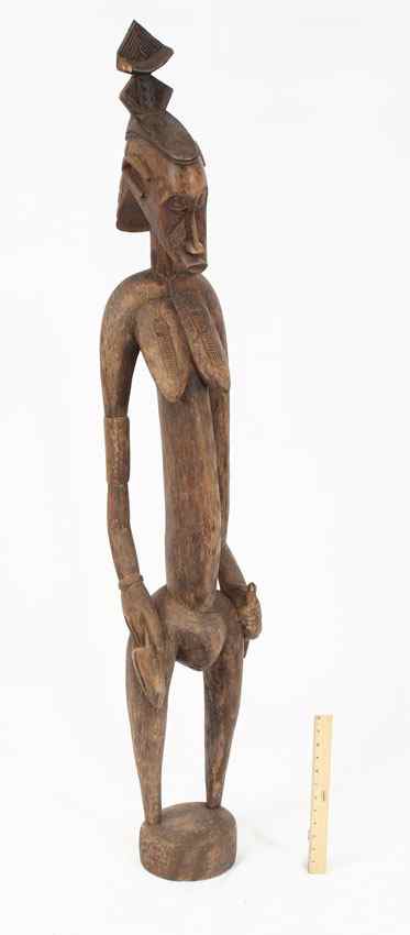 Appraisal: CARVED AFRICAN TALL SENUFO FEMALE FIGURE '' x '' x