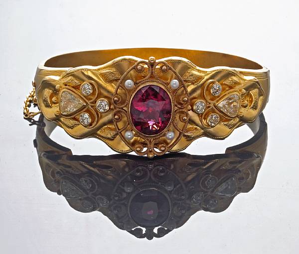 Appraisal: A rubellite tourmaline diamond and seed pearl bangle bracelet tourmaline