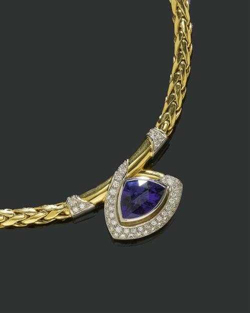 Appraisal: TANZANITE AND BRILLIANT-CUT DIAMOND NECKLACE Yellow gold Casual-elegant braided chain