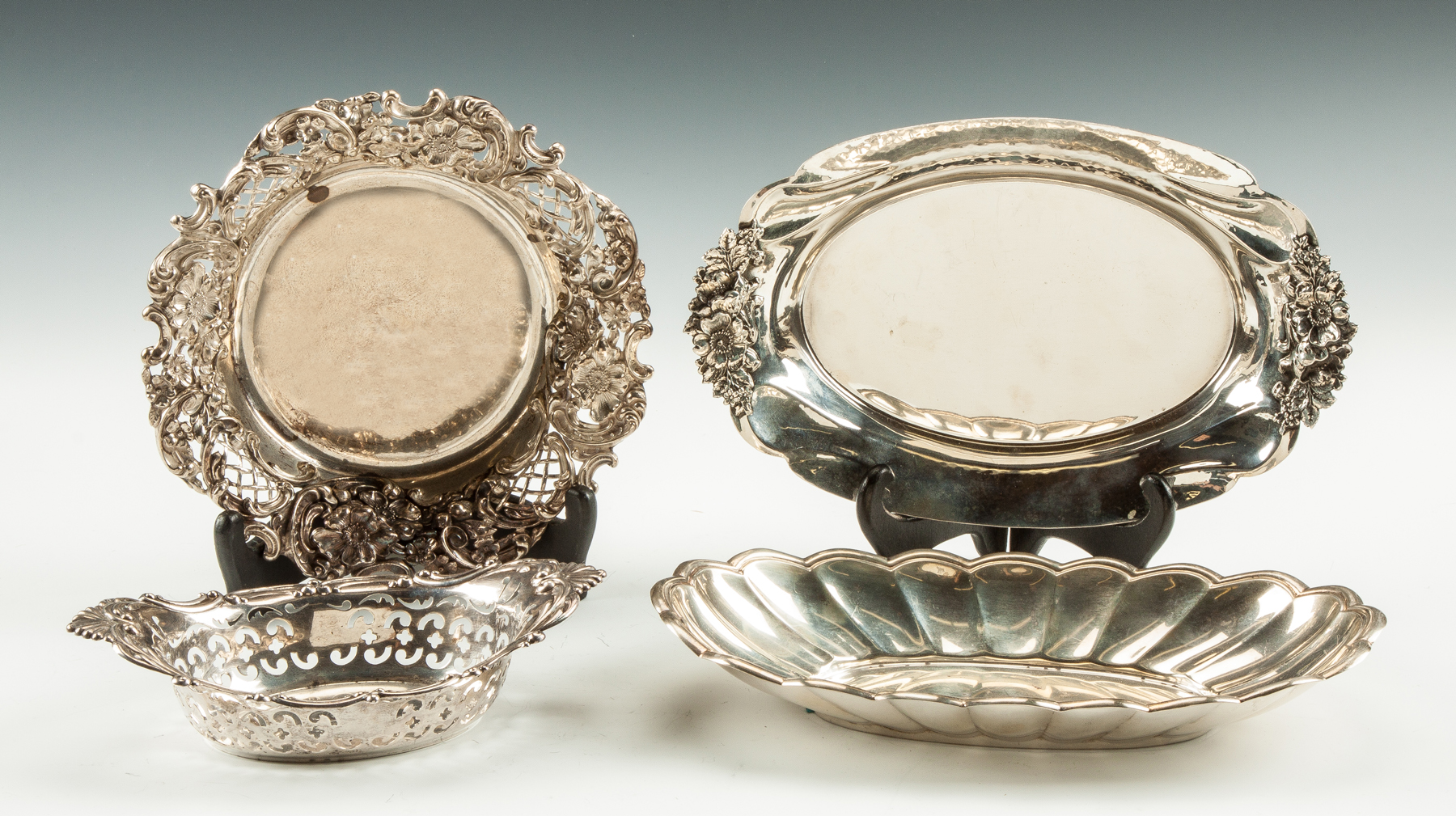 Appraisal: Four Sterling Silver Table Articles Bowl with reticulated repousee floral