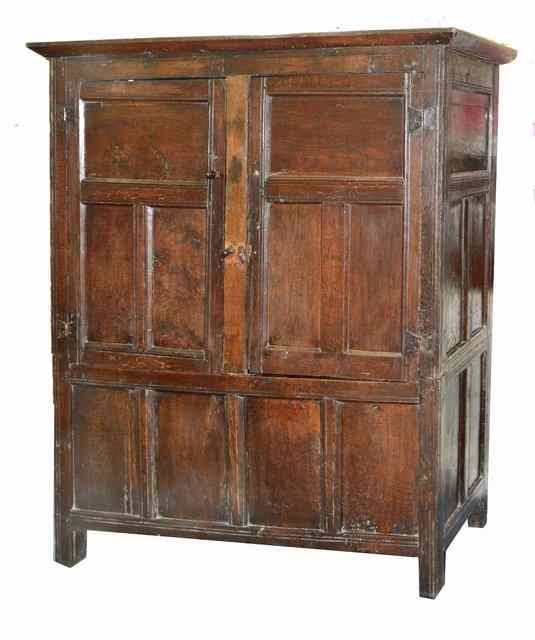 Appraisal: AN TH CENTURY OAK HALL CUPBOARD the interior with hooks