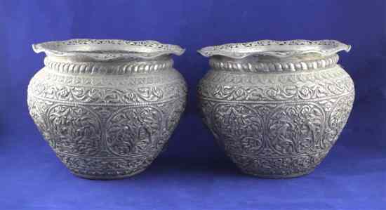 Appraisal: A pair of Indian white metal jardineres of circular baluster