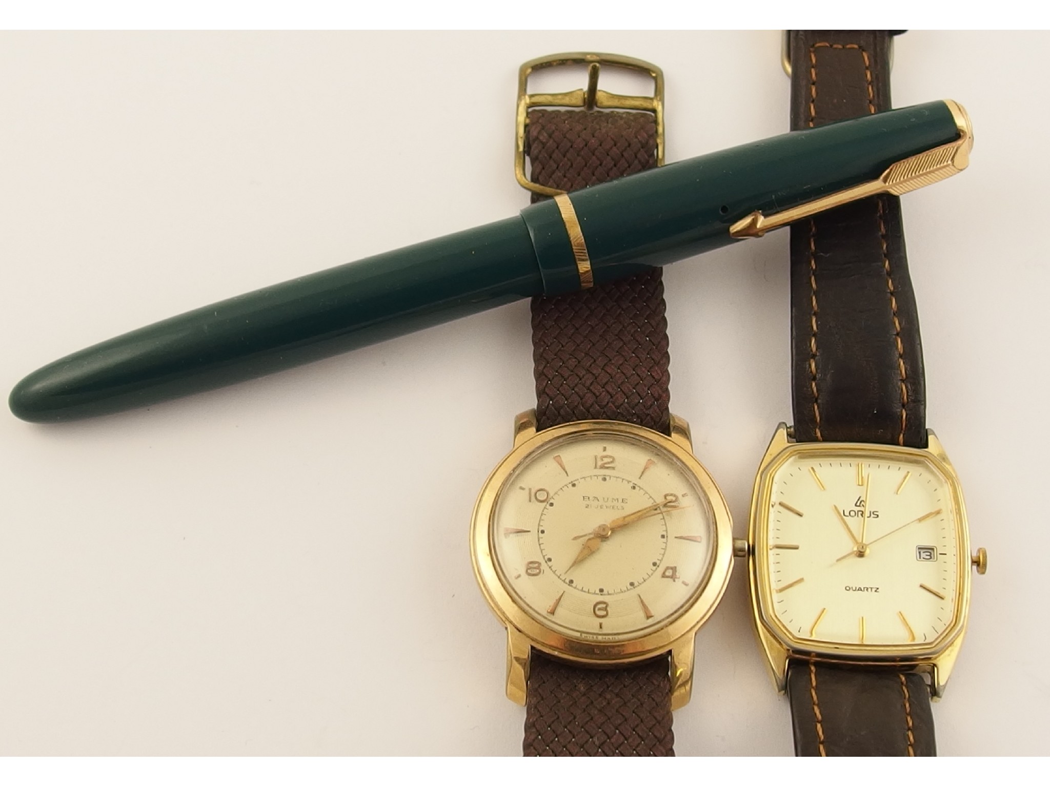 Appraisal: A stainless steel gold plated gents vintage Baume jewel watch