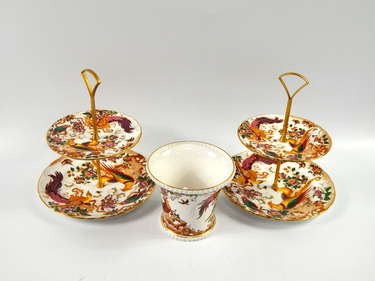 Appraisal: A pair of Royal Crown Derby porcelain two tier cake