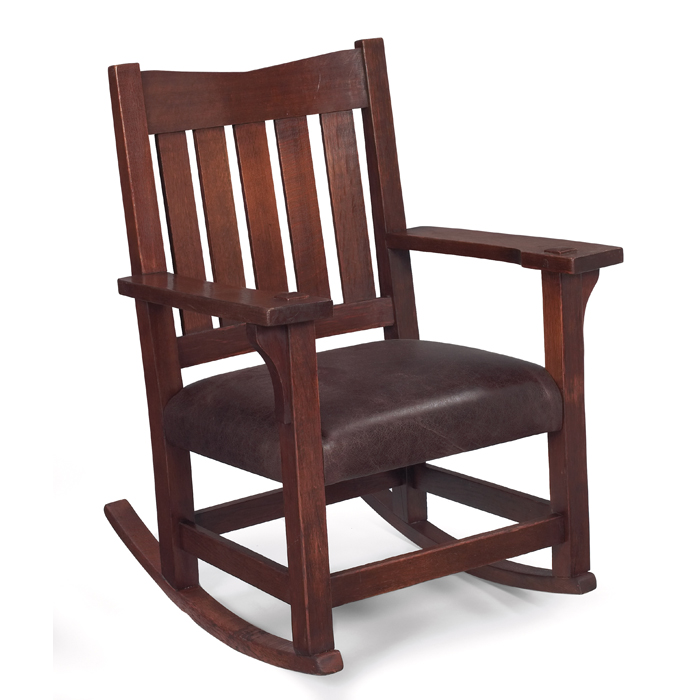 Appraisal: Gustav Stickley rocker ''V''back form over a replaced leather seat