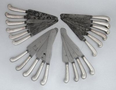 Appraisal: Twenty-one assorted th century table knives with pistol handles and