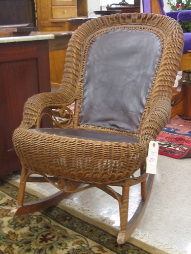 Appraisal: LATE VICTORIAN WICKER AND BROWN LEATHER ROCKER American c -