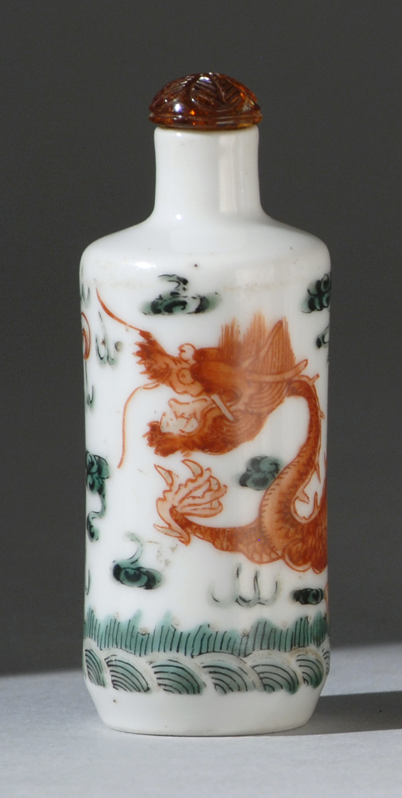 Appraisal: POLYCHROME PORCELAIN SNUFF BOTTLE th CenturyIn cylinder form with five-claw