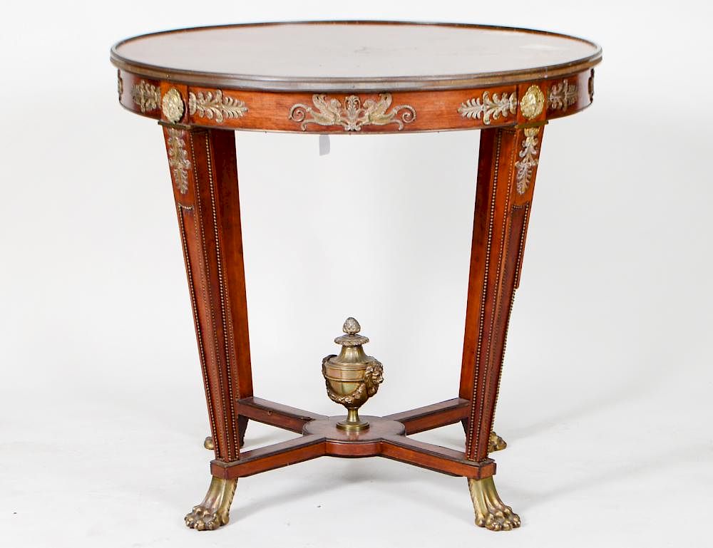 Appraisal: EMPIRE STYLE BRONZE MAHOGANY CIRCULAR TABLE Circa Probably French The