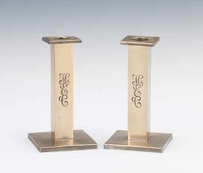 Appraisal: A Pair of Monogramed Sterling Silver Candlesticks Simple squared column