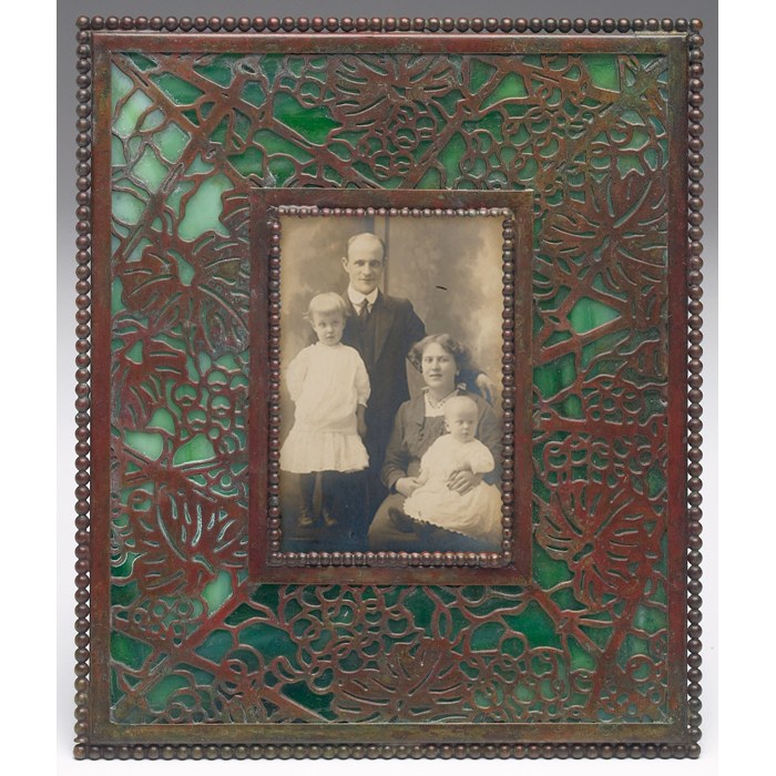 Appraisal: Tiffany Studios frame bronze in the grapevine pattern over green