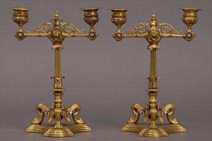 Appraisal: PAIR OF NEOCLASSICAL-STYLE BRASS TWO-LIGHT CANDELABRA Each reeded stem with