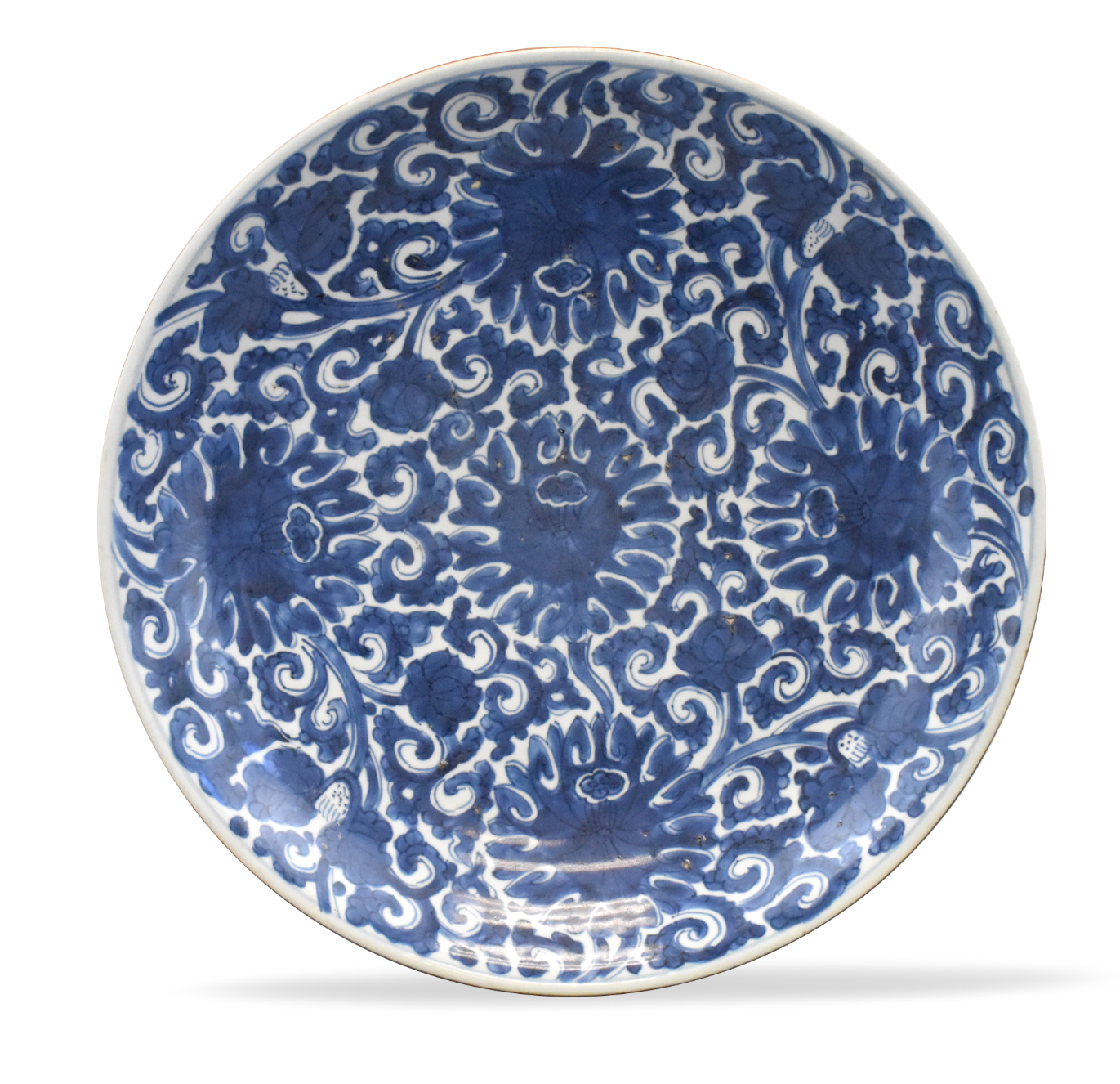 Appraisal: A chinese blue white scrolling lotus charger dating from the