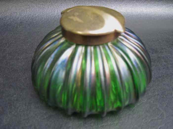 Appraisal: LOETZ ART GLASS INKWELL green iridescent ribbed glass hinged metal