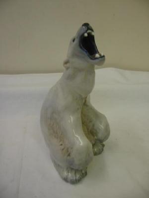 Appraisal: A ROYAL COPENHAGEN PORCELAIN FIGURE modelled as a polar bear