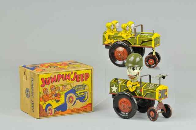 Appraisal: JUMPING JEEP AND JOLLY JOE IN JEEP Includes one box