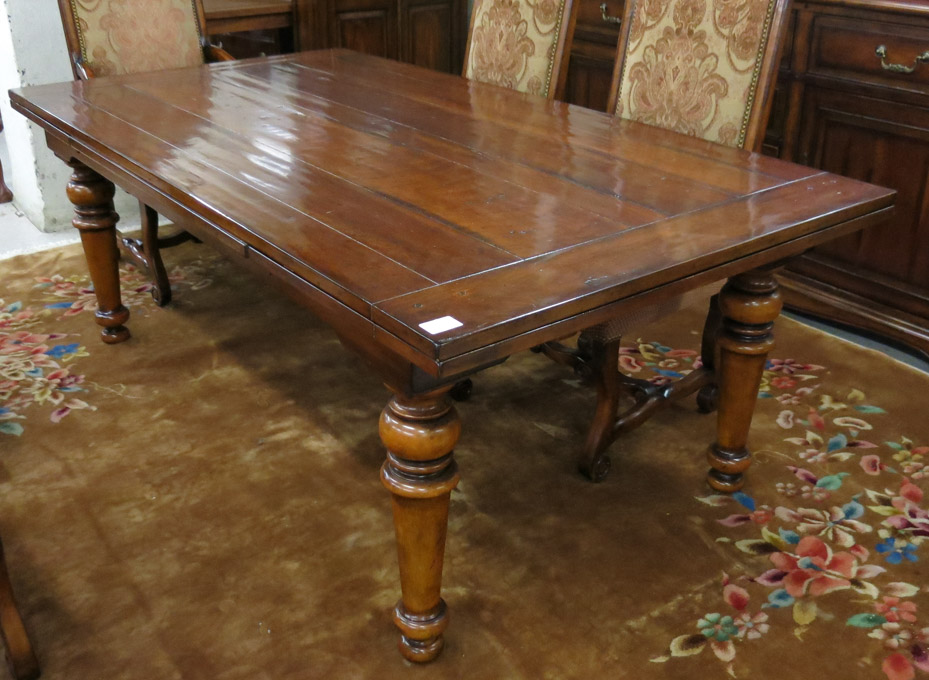 Appraisal: A RECTANGULAR DRAW-LEAF DINING TABLE antique reproduction unknown maker standing