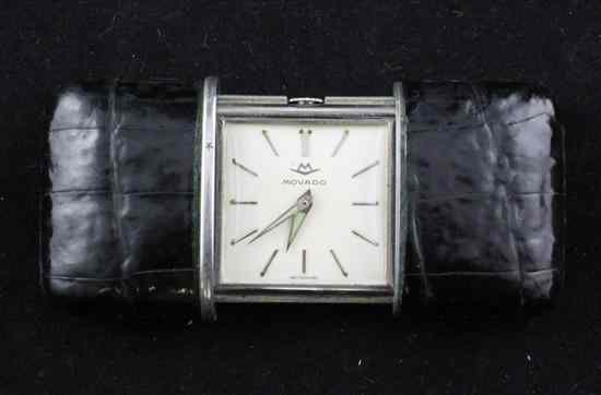 Appraisal: A 's faux skin cased base metal Movado travelling watch