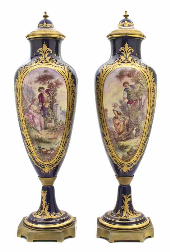 Appraisal: A Pair of Sevres Style Gilt Bronze Mounted Vases each