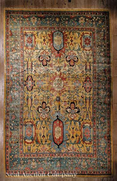 Appraisal: A Persian Sultanabad Carpet mustard salmon and blue ground repeating