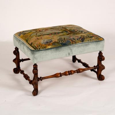 Appraisal: A rectangular Flemish oak stool the needlework top with scene