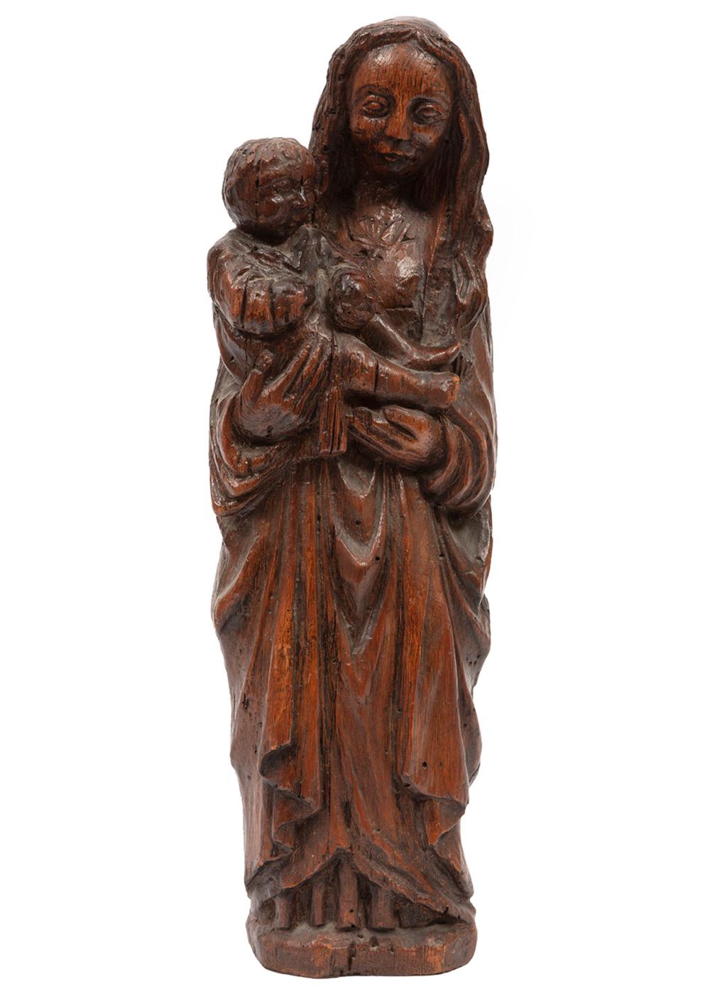 Appraisal: CARVED FIGURE OF MARY AND THE CHRIST CHILDAntique Continental Carved